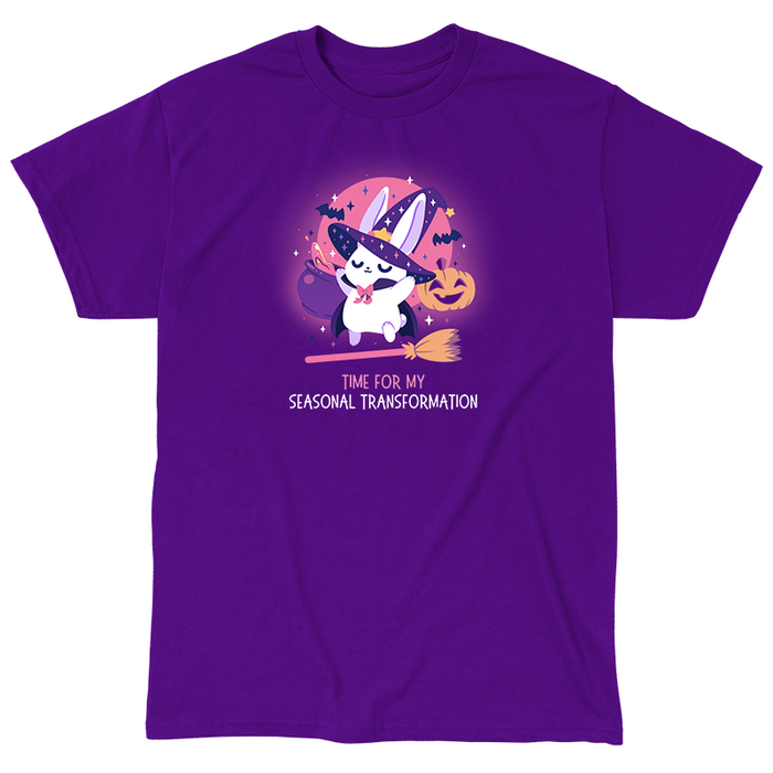 Classic Cotton T-shirt_TeeTurtle purple Time For My Seasonal Transformation apparel featuring a white bunny wearing a sparkling purple witch hat and cloak on top of a flying broom with a cauldron, bats, jack-o'-lantern, and the full red moon in the background.
