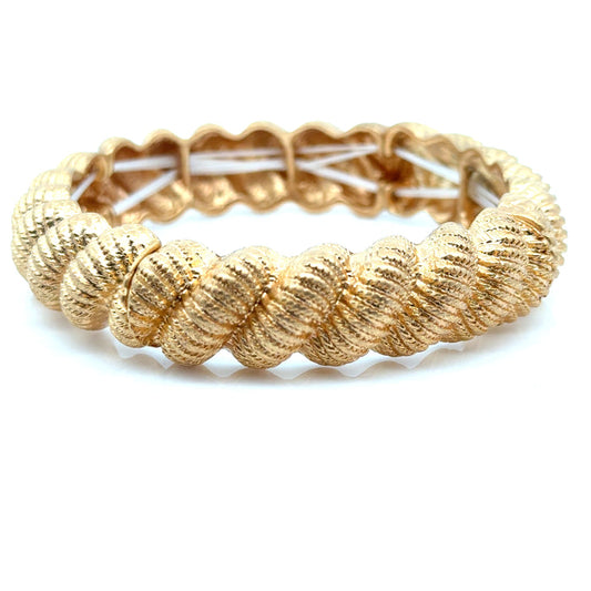 Style the Twisted Gold Stretch Bracelet exclusively at Born To Glam