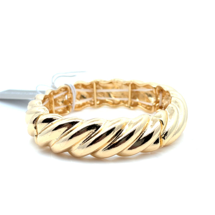 Style the Vicky Twisted Gold Stretch Bracelet exclusively at Born To Glam