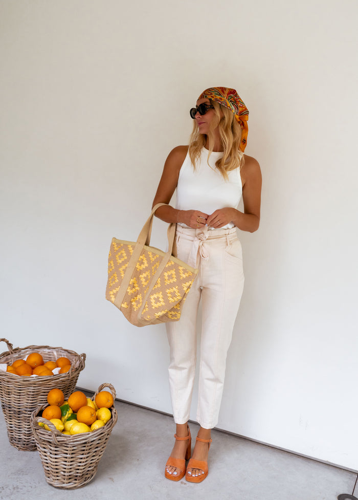 White sleeveless tank top high round neckline detail
