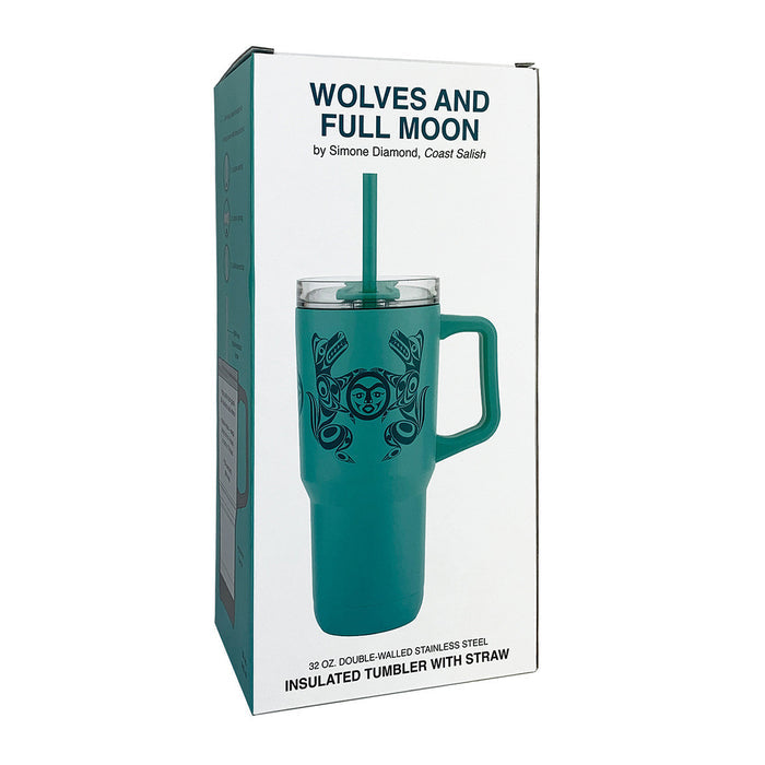 Teal insulated tumbler with straw in packaging, featuring 'Wolves and Full Moon' design.